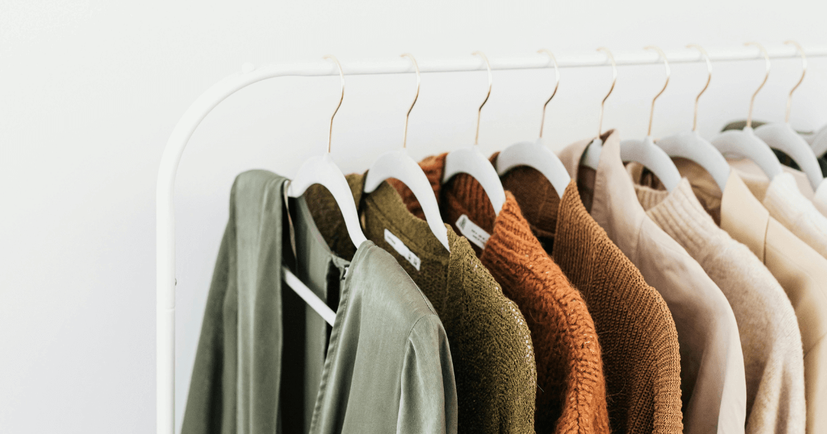 jackets and sweaters on hangers